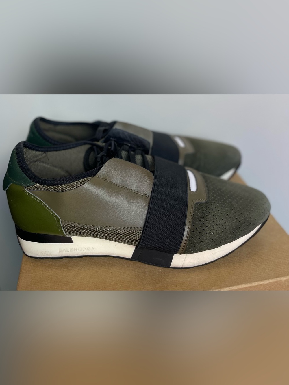 Balenciaga Race Runner sneakers in a military
green
colorway Size 10 US